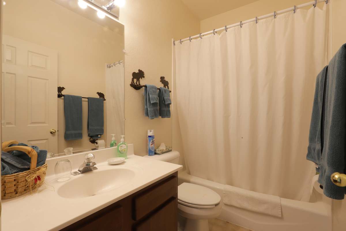 Private bathroom with tub and shower